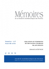 Création de fermions par des trous noirs chargés en rotation