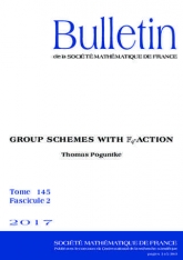 Schémas en groupes avec $\mathbb F_q$-action